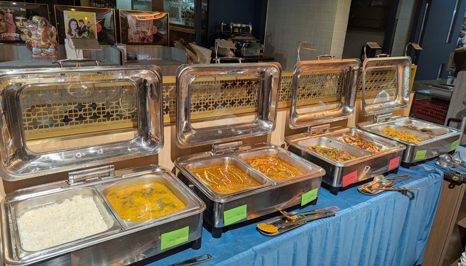 Weekday Indian buffet spread with curries, rice, breads and starters at Hello India